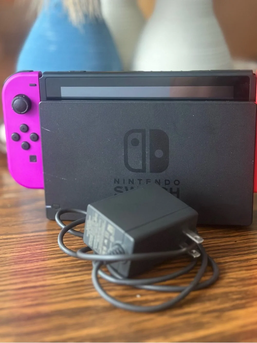 Nintendo Switch with Bright Pink Left Joy-Con and Red Right Joy-Con